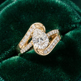 Yellow gold Pear Solitaire Bypass Diamond Engagement Ring with Channel-Set Band and Four-Prong Setting_27