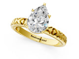 Yellow gold Pear Solitaire Diamond Engagement Ring with XO Engraved Band and Four-Prong Setting 1