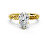 Yellow gold Pear Solitaire Diamond Engagement Ring with XO Engraved Band and Four-Prong Setting