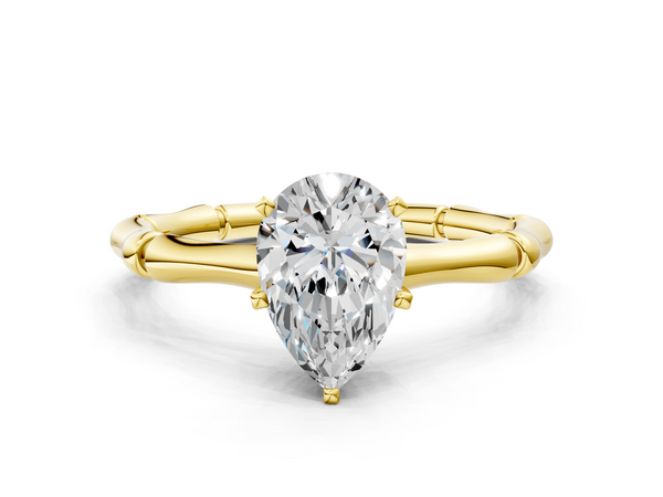Yellow gold Pear Solitaire Diamond Ring with Bamboo Band and Four-Prong Setting
