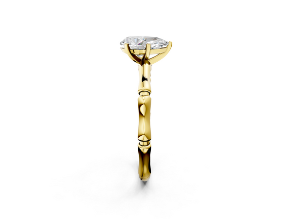 Yellow gold Pear Solitaire Diamond Ring with Bamboo Band and Four-Prong Setting