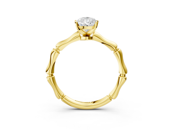 Yellow gold Pear Solitaire Diamond Ring with Bamboo Band and Four-Prong Setting