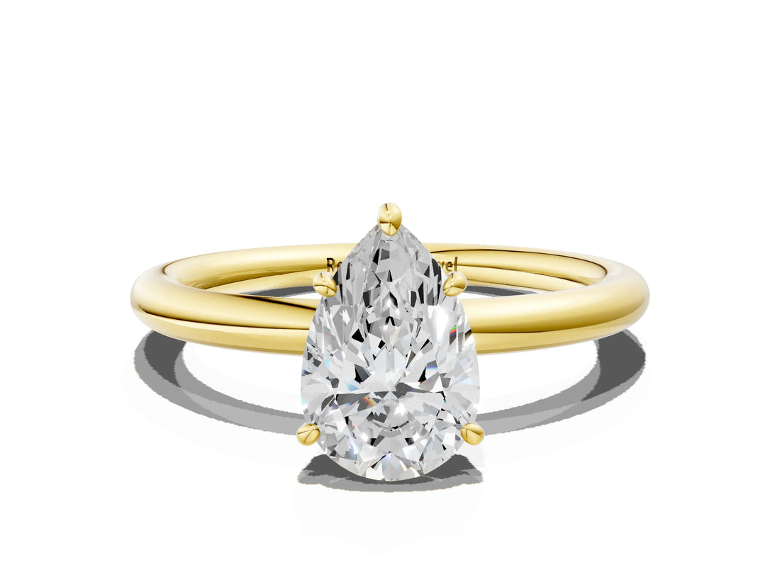 Yellow gold Pear Solitaire Diamond Ring with Four-Prong Setting on a Plain Band_20