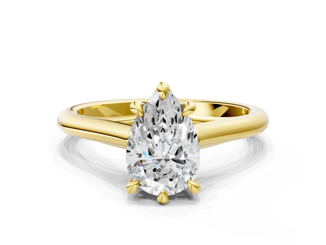Yellow gold Pear Solitaire Engagement Ring with Six-Prong Setting and Classic Band