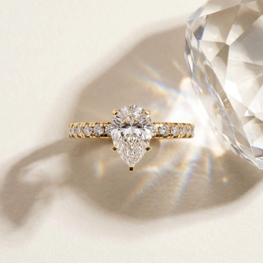 Yellow gold Pear Solitaire Pave Diamond Engagement Ring with Four-Prong Setting