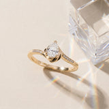 Yellow gold Pear Solitaire Twist Band with Channel-Set Diamonds and Four-Prong Setting_5