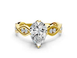 Yellow gold Pear Solitaire Twist Band with Leaf Prong Setting