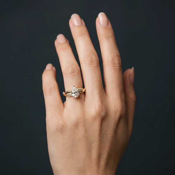 Yellow gold Pear Solitaire Twist Band with Pave Prong Setting