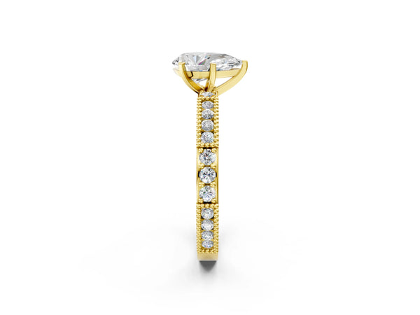 Yellow gold Pear Solitaire with Pavé Band and Four-Prong Setting