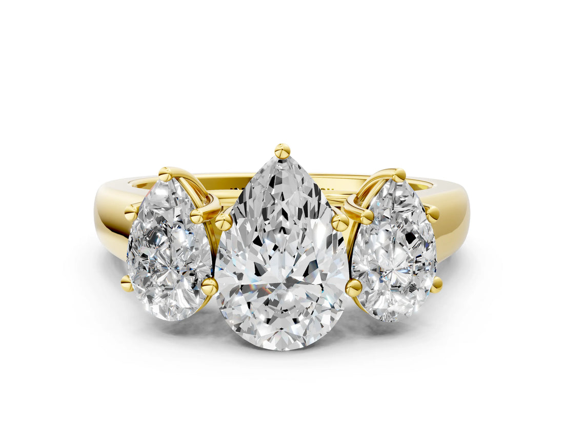Yellow gold Pear Three-Stone Diamond Ring with Prong Setting on a Classic Band_15
