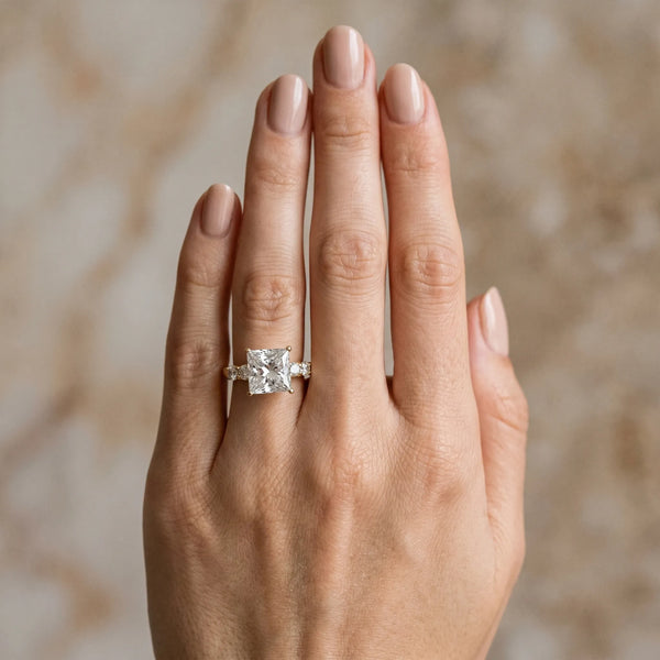 Yellow gold Princess Brilliant Diamond Five-Stone Engagement Ring with Prong Setting on a Classic Band