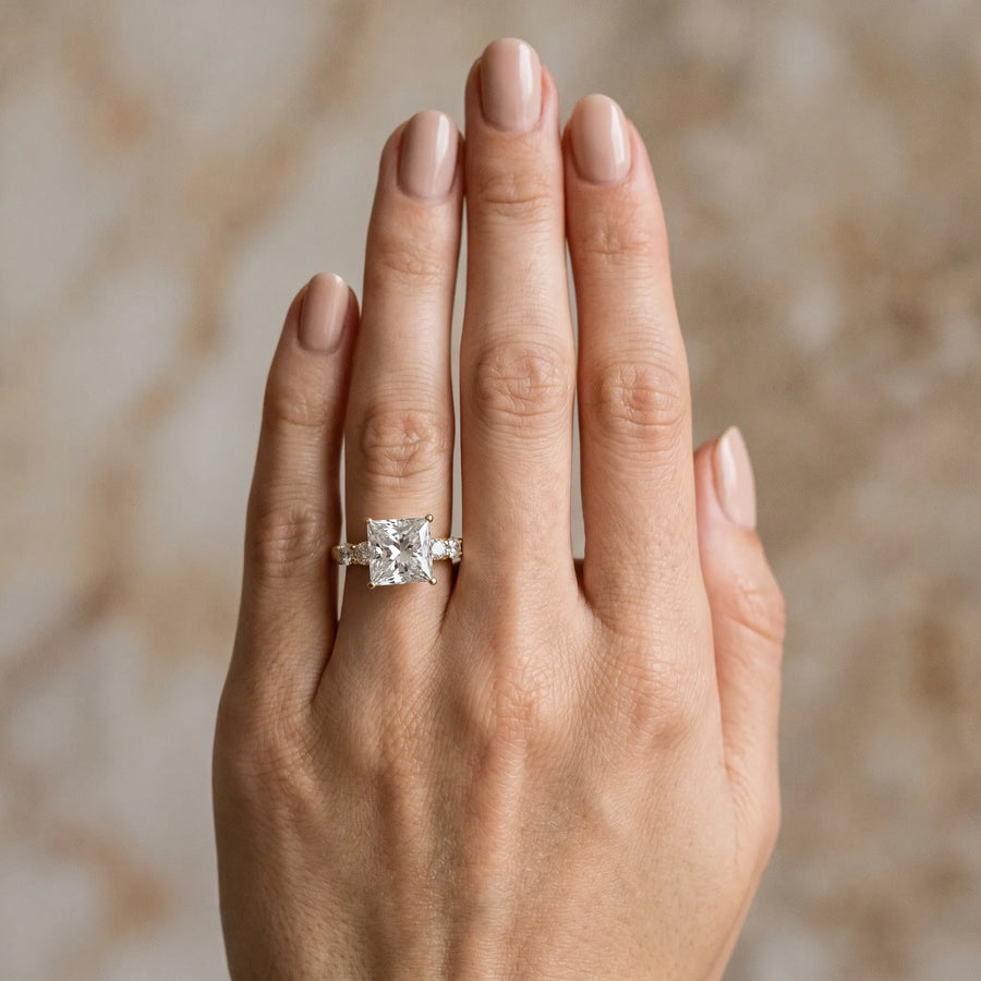 Yellow gold Princess Brilliant Diamond Five-Stone Engagement Ring with Prong Setting on a Classic Band