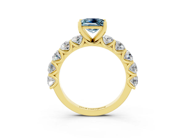 Yellow gold Princess Cut Aquamarine Prong Setting with Side Stones on a Pave Band