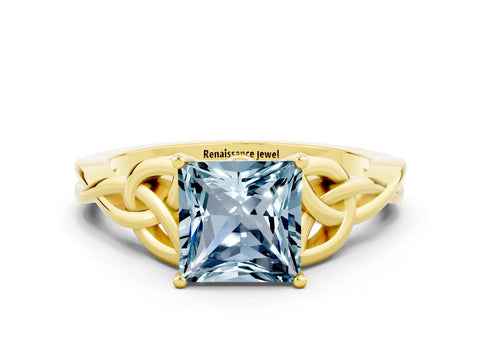 Yellow gold Princess Cut Aquamarine Solitaire Engagement Ring with Celtic Knot Band and Four-Prong Setting