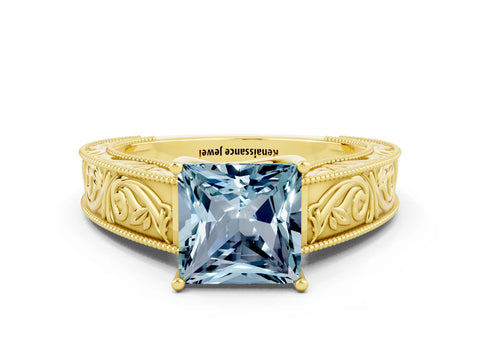 Yellow gold Princess Cut Aquamarine Solitaire Ring with Engraved Band and Four-Prong Setting