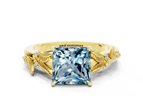 Yellow gold Princess Cut Aquamarine Solitaire Ring with Leaf Motif Band and Four-Prong Setting