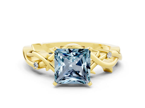 Yellow gold Princess Cut Aquamarine Solitaire Ring with Twisted Band and Prong Setting