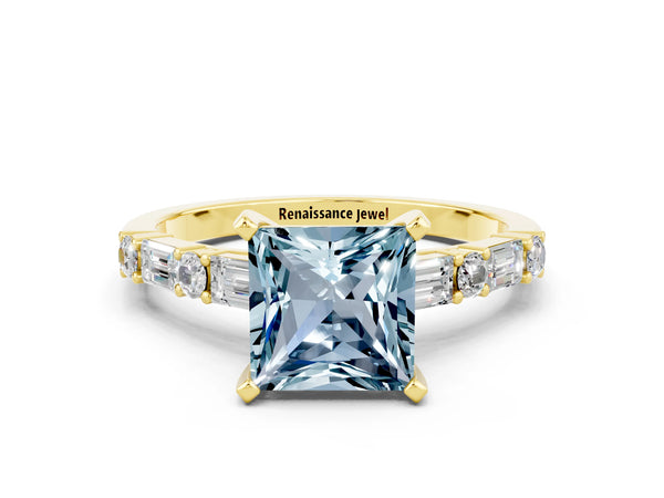 Yellow gold Princess Cut Aquamarine Solitaire with Side Baguettes and Channel Set Band