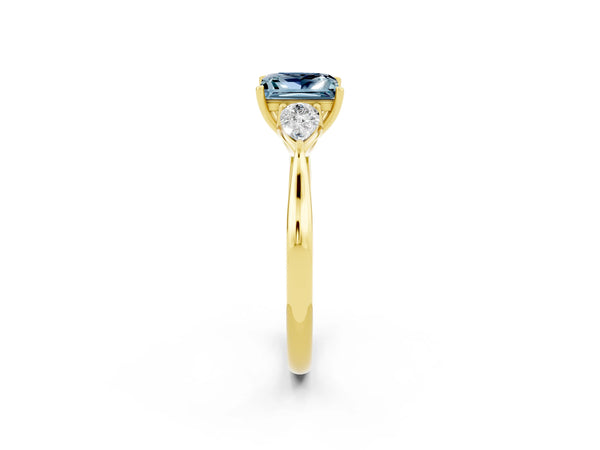 Yellow gold Princess Cut Aquamarine Three-Stone Ring with Pear  Side Stones and Prong Setting