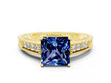 Yellow gold Princess Cut Blue Sapphire Engagement Ring with Milgrain Channel Set Band and Prong Setting
