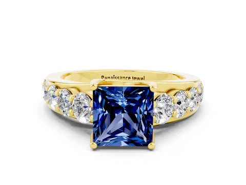 Yellow gold Princess Cut Blue Sapphire Engagement Ring with Pavé Band and Four-Prong Setting