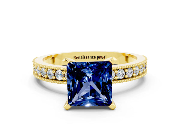 Yellow gold Princess Cut Blue Sapphire Milgrain Pavé Engagement Ring with Four-Prong Setting
