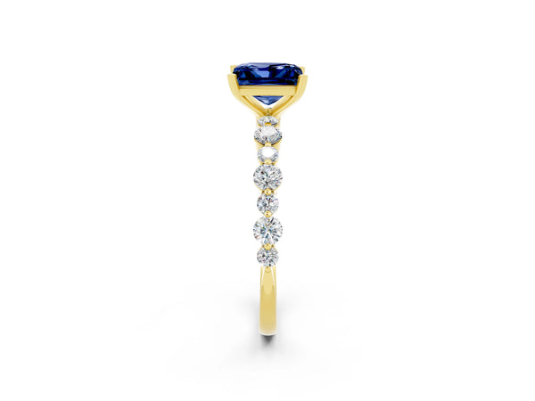 Yellow gold Princess Cut Blue Sapphire Prong Set Engagement Ring with Pavé Band