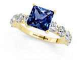 Yellow gold Princess Cut Blue Sapphire Prong Setting with Side Stones on a Pave Band_1