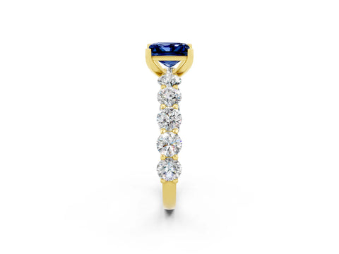 Yellow gold Princess Cut Blue Sapphire Prong Setting with Side Stones on a Pave Band_2