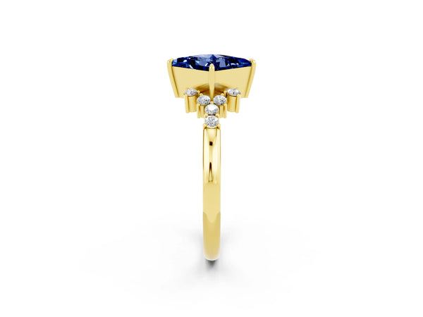 Yellow gold Princess Cut Blue Sapphire Ring with Side Stones and Four-Prong Setting