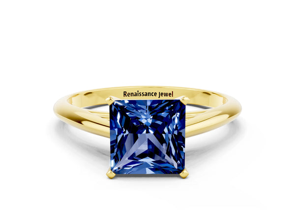Yellow gold Princess Cut Blue Sapphire Solitaire Engagement Ring with Cathedral Setting and Four-Prong Mount