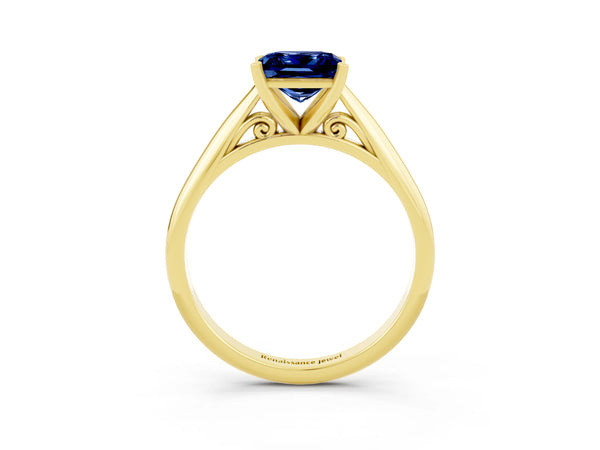 Yellow gold Princess Cut Blue Sapphire Solitaire Engagement Ring with Cathedral Setting and Four-Prong Mount