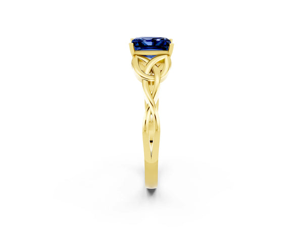 Yellow gold Princess Cut Blue Sapphire Solitaire Engagement Ring with Celtic Knot Band and Four-Prong Setting