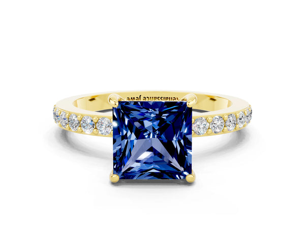 Yellow gold Princess Cut Blue Sapphire Solitaire Engagement Ring with Pavé Band and Four-Prong Setting