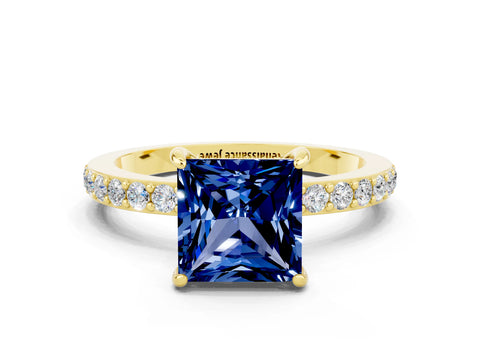 Yellow gold Princess Cut Blue Sapphire Solitaire Engagement Ring with Pavé Band and Four-Prong Setting