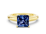 Yellow gold Princess Cut Blue Sapphire Solitaire Engagement Ring with Round Band and Four-Prong Setting