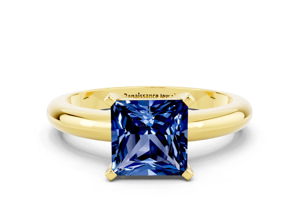 Yellow gold Princess Cut Blue Sapphire Solitaire Engagement Ring with Round Band and Four-Prong Setting