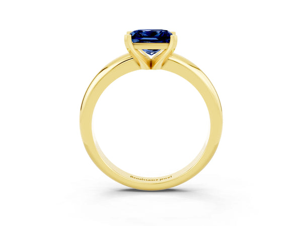 Yellow gold Princess Cut Blue Sapphire Solitaire Engagement Ring with Round Band and Four-Prong Setting