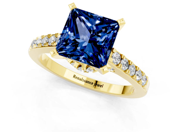 Yellow gold Princess Cut Blue Sapphire Solitaire Ring with Crossover Gallery and Round  Pavé Band