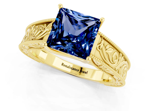 Yellow gold Princess Cut Blue Sapphire Solitaire Ring with Engraved Band and Four-Prong Setting
