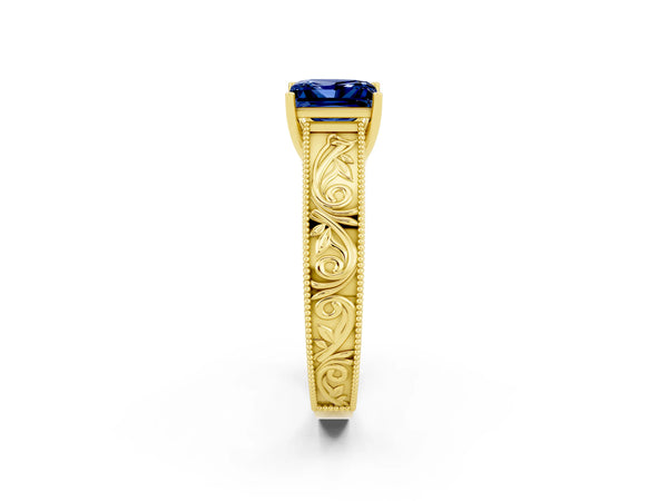 Yellow gold Princess Cut Blue Sapphire Solitaire Ring with Engraved Band and Four-Prong Setting