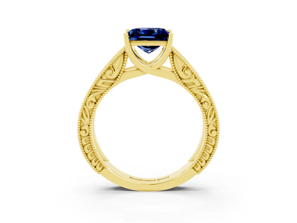 Yellow gold Princess Cut Blue Sapphire Solitaire Ring with Engraved Band and Four-Prong Setting