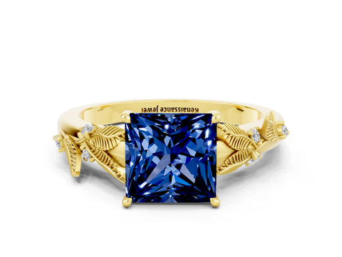 Yellow gold Princess Cut Blue Sapphire Solitaire Ring with Leaf Motif Band and Four-Prong Setting