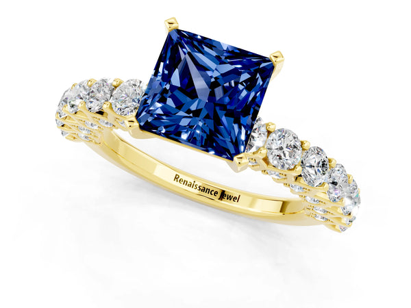 Yellow gold Princess Cut Blue Sapphire Solitaire Ring with Shared Prong Pavé Band and Four-Prong Setting