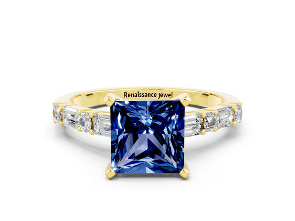 Yellow gold Princess Cut Blue Sapphire Solitaire with Side Baguettes and Channel Set Band