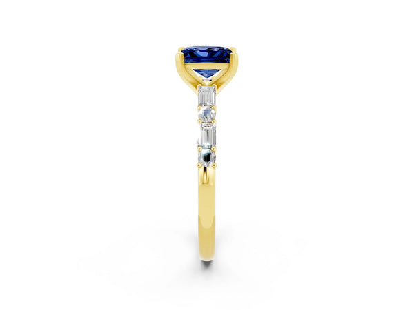 Yellow gold Princess Cut Blue Sapphire Solitaire with Side Baguettes and Channel Set Band