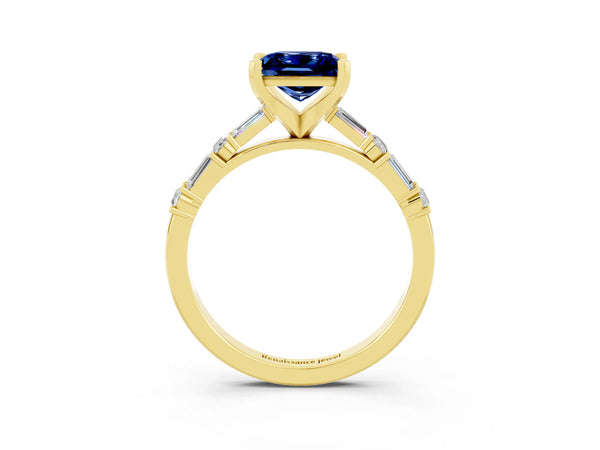 Yellow gold Princess Cut Blue Sapphire Solitaire with Side Baguettes and Channel Set Band