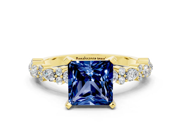 Yellow gold Princess Cut Blue Sapphire Side Stone Solitaire Ring with Round  and Four-Prong Setting