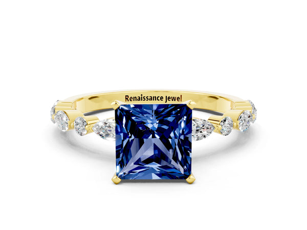 Yellow gold Princess Cut Blue Sapphire Ring with Marquise and Round  Side Stones and Four-Prong Setting