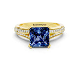 Yellow gold Princess Cut Blue Sapphire Split Shank Engagement Ring with Pavé Band